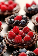 Delicious tartlets with chocolate and fresh berries