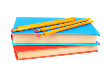 Books and pencils. On white background.