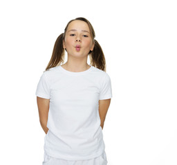 Cute young girl puckering up for a kiss