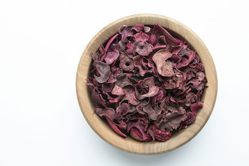 Wooden pot with dry flowers