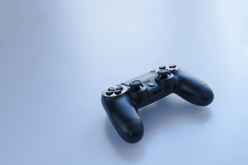 game controller on a blue-gray background © pirke