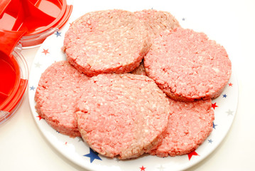 Fresh Raw Hamburgers Made with a Hamburger Press