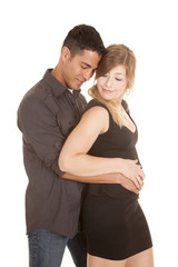 Couple dark outfits close eyes down