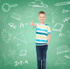 little boy in casual clothes with arms crossed