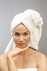 Pretty young woman relaxing in the spa