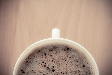 Beverage. Cup of hot drink coffee with froth.