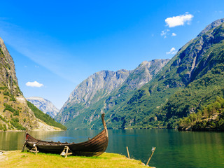 Tourism and travel. Mountains and fjord in Norway. - obrazy, fototapety, plakaty