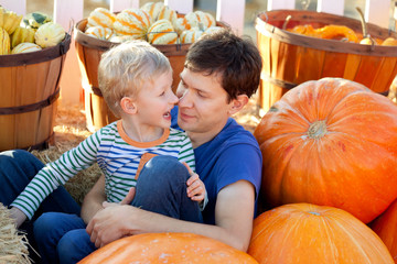 Fototapeta premium family at pumpkin patch