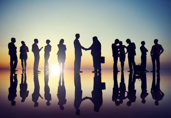 Group of Business People in Back Lit