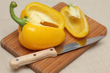 Yellow bell pepper on a cutting board