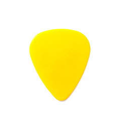 Naklejka premium yellow guitar pick isolated on white