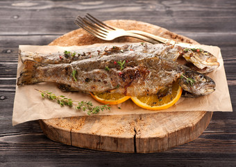 Baked trout fish with thyme