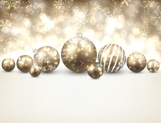 Winter background with golden christmas balls.