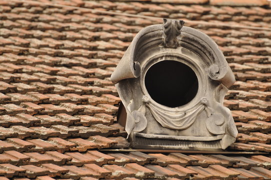 Roof and small rounded window