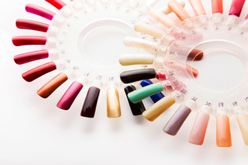 Manicure nail polish color samples. on white background