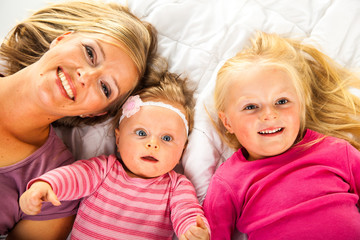 Mother with two young daughters