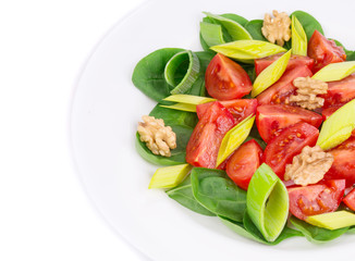 Healthy salad with leek and walnuts.