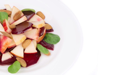 Beet salad with spinach and minced apple.
