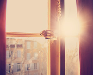 retro window and the sun's rays in the morning