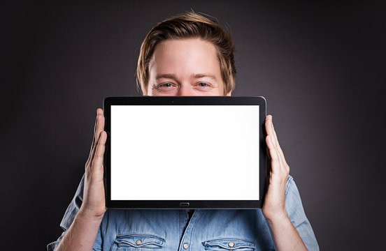 Guy holding a Tablet PC