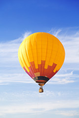 Fototapeta premium Flying balloon in blue sky
