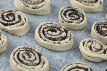 Poppy seed buns before baking