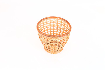 wicker basket for fruits isolated on white background