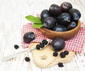 Fresh purple plums and blackberry