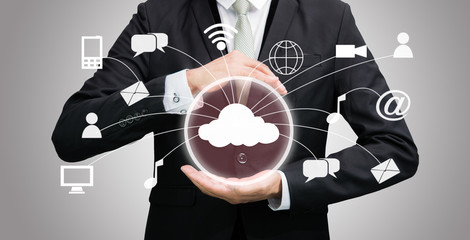 Businessman holding cloud computing network