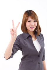 Happy, beautiful, smiling business woman showing victory V