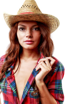 portrait of a beautiful woman cowgirl on white background