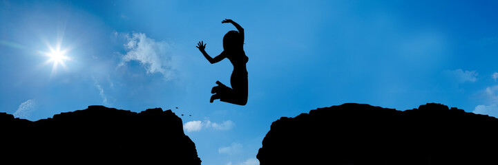 jumping over a precipice between 2 mountains v2 - 3 to 1 - g1383 © fotohansel