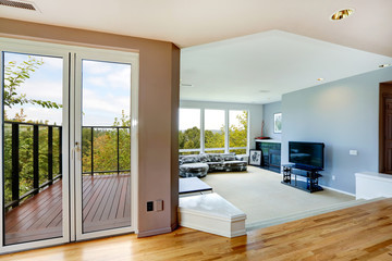 House interior. Living room and walkout deck