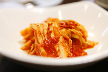 Korean food, close-up kimuchi on white dish