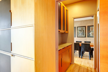 Hallway connecting kitchen and dining room