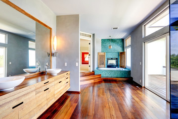 Fototapeta na wymiar Bathroom interior with turquoise tile wall trim