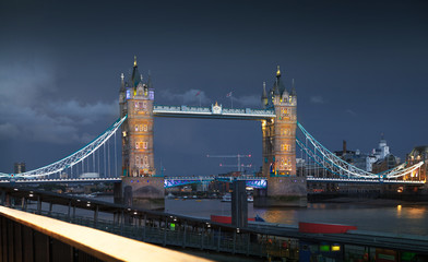 Tower bridge on the river Thames in night lights