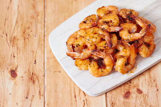 Shrimps on a wooden board