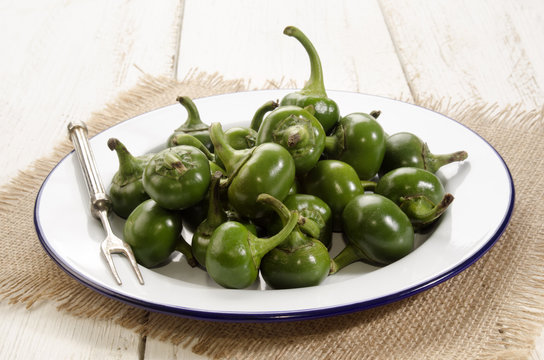 Green Cherry Peppers On A Plate