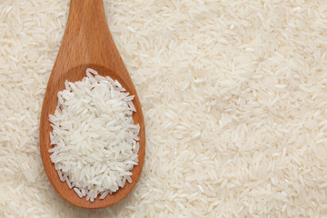 Rice in a wooden spoon