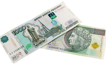 Obraz na płótnie Canvas Russian and Polish banknotes