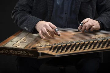 Wall murals Theater Qanun, a zither like instrument with seventy-eight strings