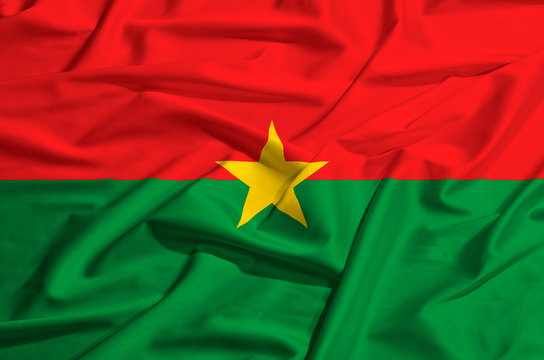 Burkina Faso  flag on a silk drape waving