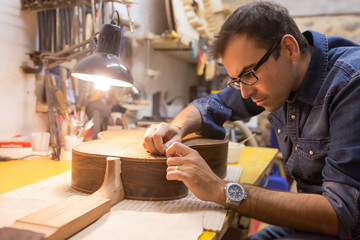 One luthier working on his next guitar