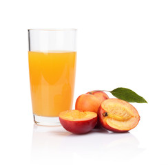 Close-up shot sliced nectarines with juice and leaf