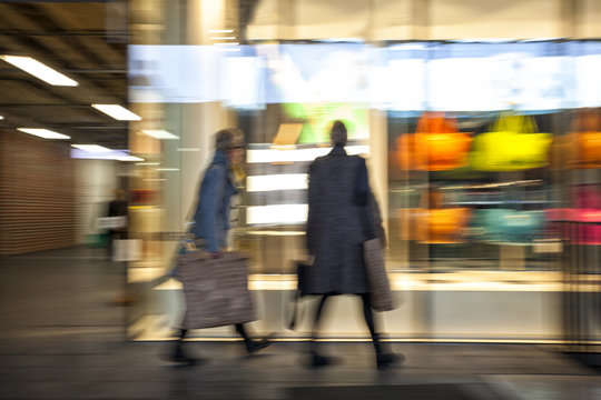 Intentional Blurred Image of Young People in Shopping Center