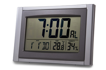 Modern alarm clock isolated en white background.