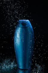 shampoo bottle in falling drops of water - 69396076
