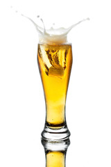 splash beer in glass - 69396464