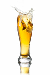 splash beer in glass - 69396692